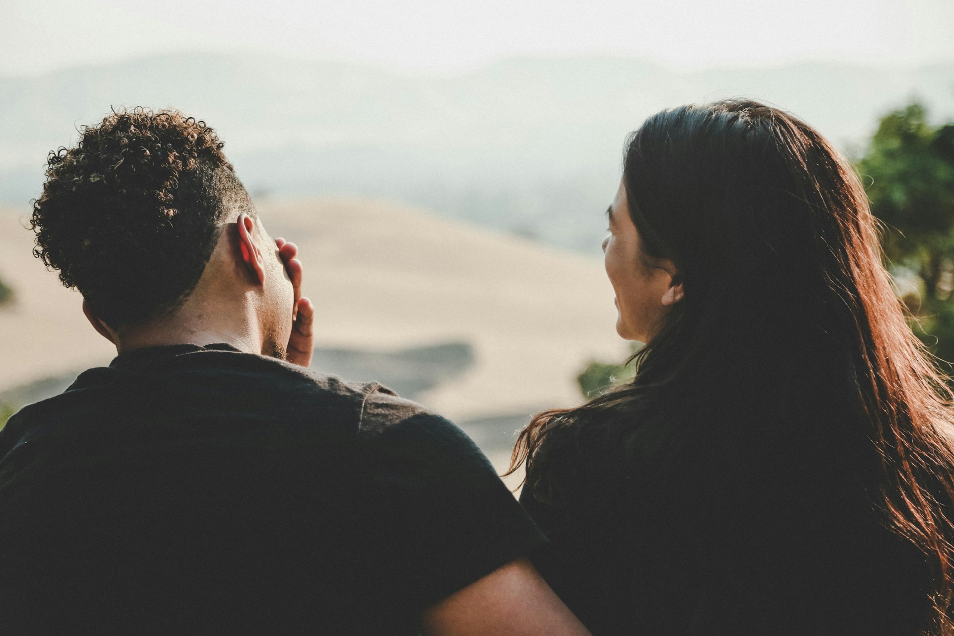 Two people talking and laughing