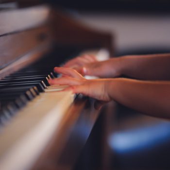 Child playing the piano.