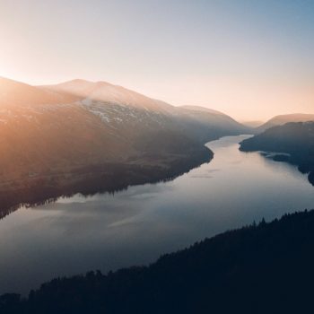 river flowing between mountains.