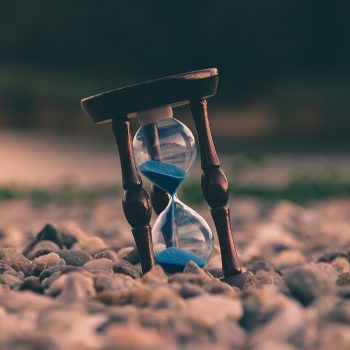 Sand timer with blue sand.