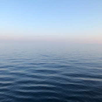 A misty ocean horizon.