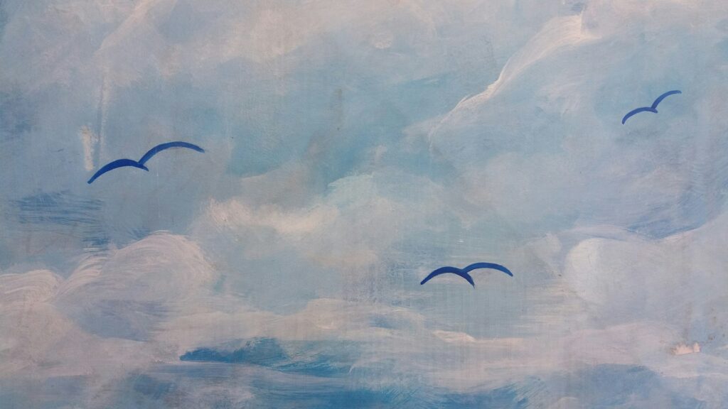 Watercolor art of birds in flight