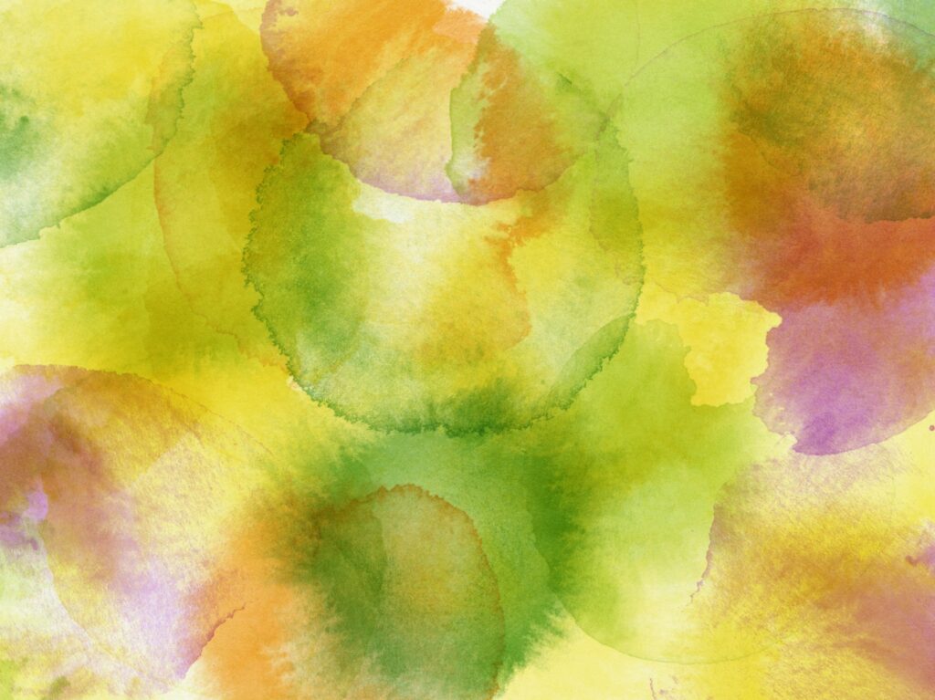 Watercolor painting of colorful green, yellow, orange, and pink circles