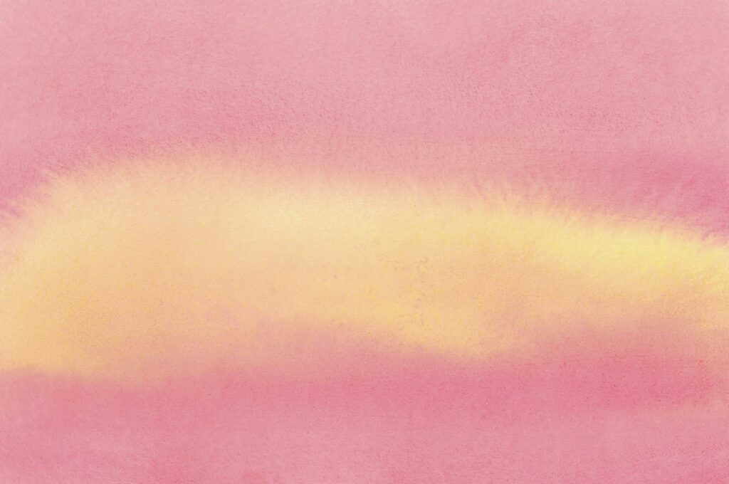 Yellow burst against a pink background